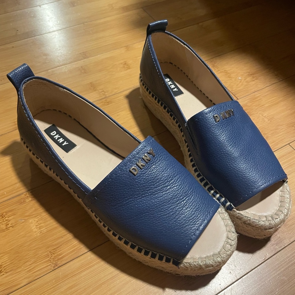 Blue platform shoe, they have a little height.